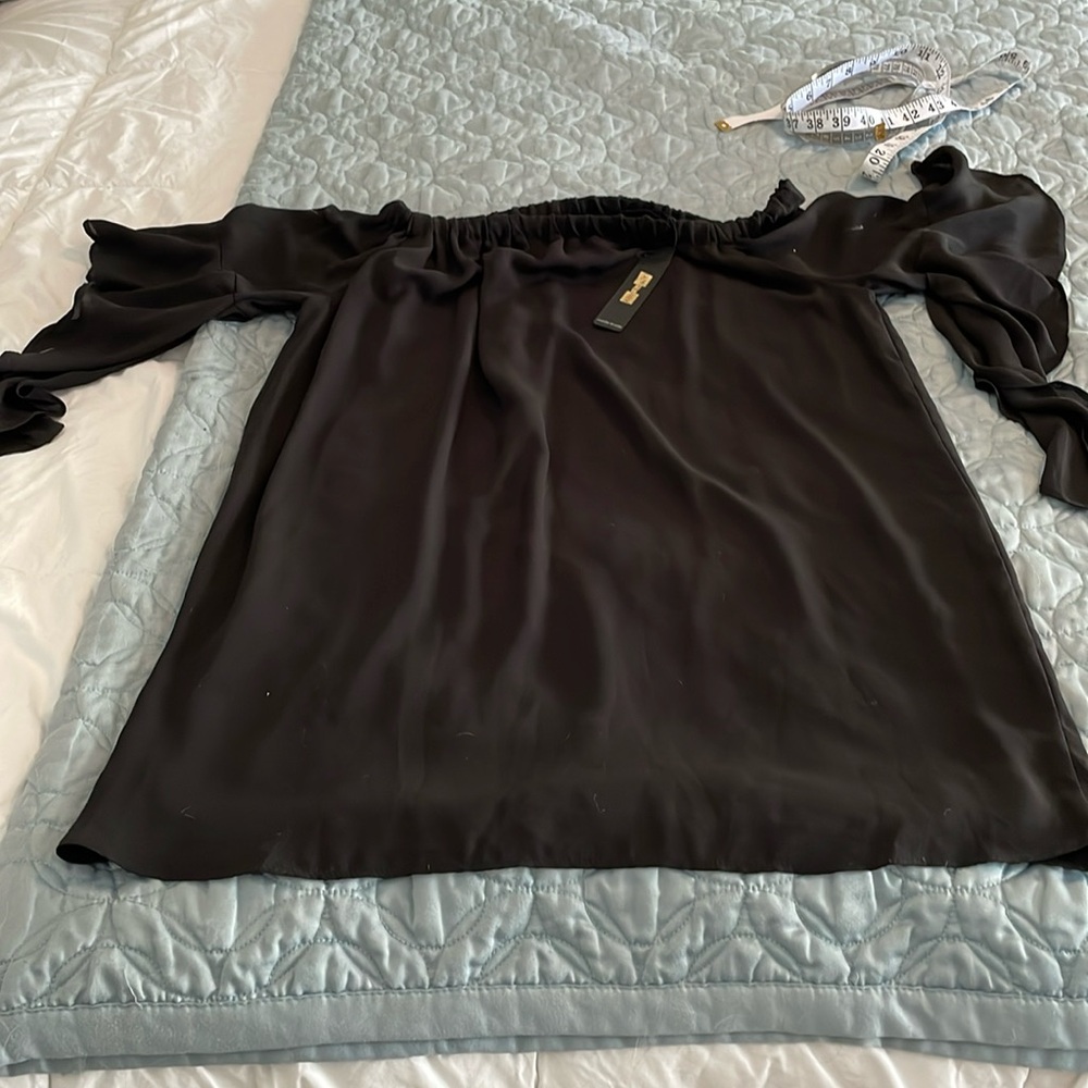 Krista black top with flutter sleeves and WT size large